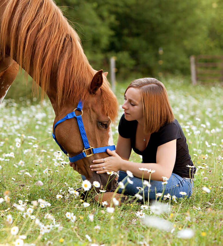 Girl with horse tablet